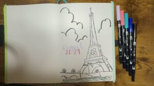 August bujo cover with Eiffel Tower Paris theme